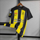 Camisa Al-Ittihad Home 2023/24 - Nike Torcedor Masculina - Amarela/Preta