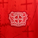 Camisa Bayer Leverkusen Home 2024/25 - Castore Torcedor Masculina - Vermelha/Preta