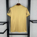 Camisa Real Madrid Treino 2025/26 - Adidas Torcedor Masculina - Dourada/Preta