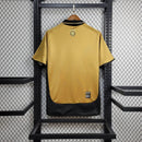 Camisa Manchester United Dupla Face 2001/02 - Umbro Retrô Masculina - Edição Especial 100 anos - Dourada/Branca