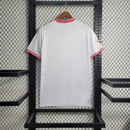 Camisa Sevilla Home 2023/24 - Castore Torcedor Masculina - Branca/Vermelha