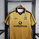 Camisa Manchester United Dupla Face 2001/02 - Umbro Retrô Masculina - Edição Especial 100 anos - Dourada/Branca