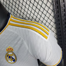 Camisa Pronta Entrega Real Madrid Home 2023/24 - Adidas Jogador Masculina - Branca/Azul + Patchs Champions League